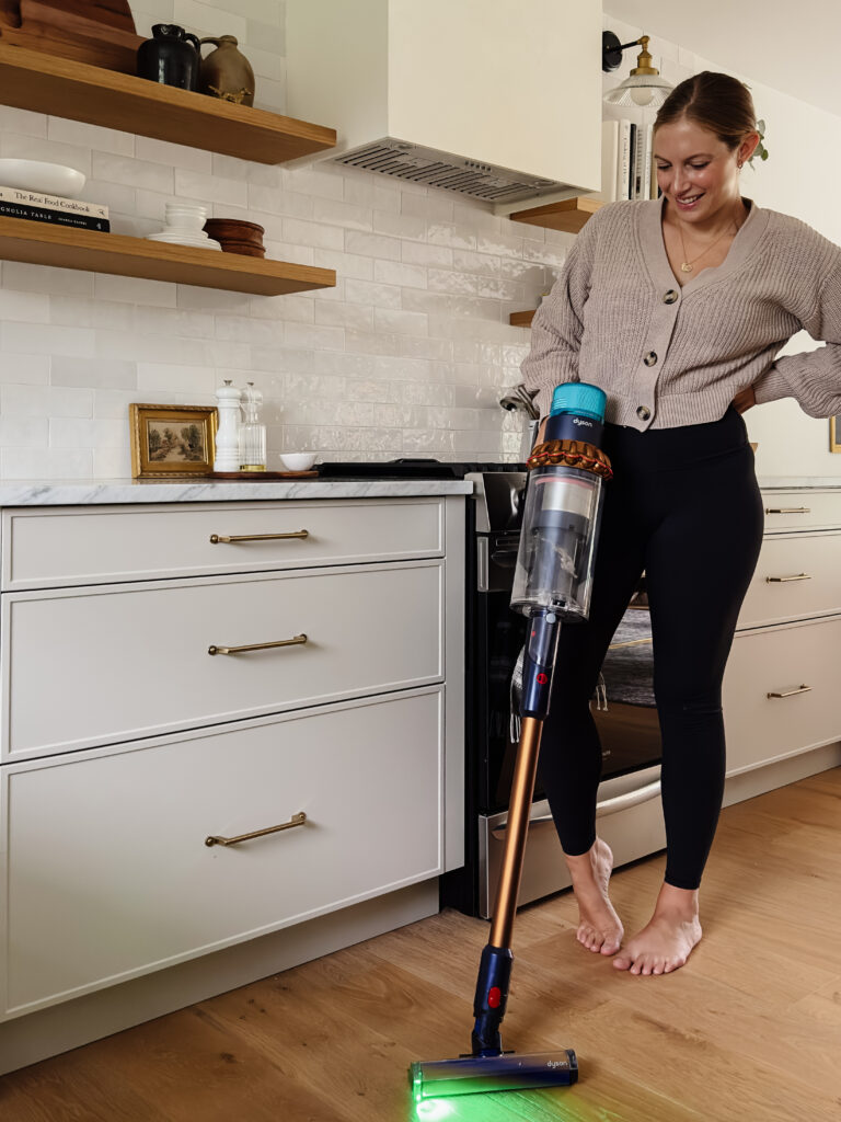 Jyll with Dyson Gen5Outsize vacuum in kitchen